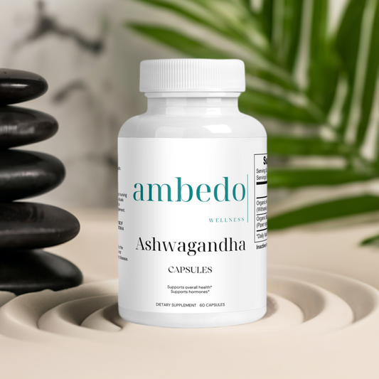 Bottle of Organic Ashwagandha Capsules with Ashwagandha roots and leaves, highlighting the natural adaptogenic properties for stress relief and immune support.